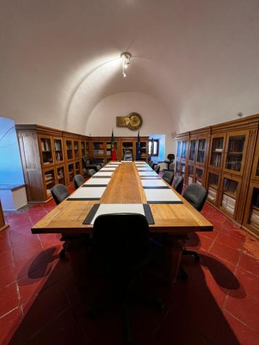 a large conference room with a long table and chairs at Convento da Orada - Monsaraz in Monsaraz