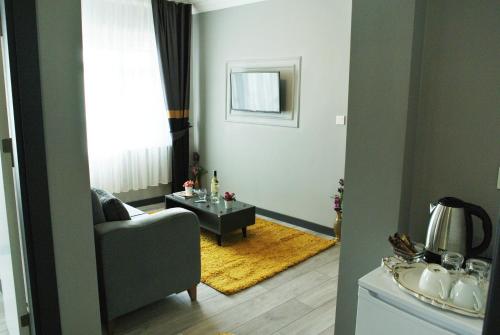 Ruang duduk di Emirhan Guesthouse & Suites