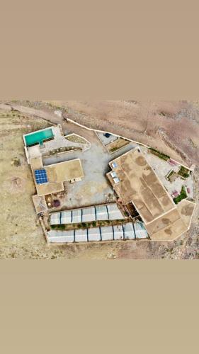 an aerial view of a building in a construction site at Touda Ecolodge Atlas Mountains in Zawyat Oulmzi
