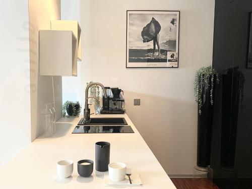 Kuchyňa alebo kuchynka v ubytovaní CHILLIapartamenty- STUDIO