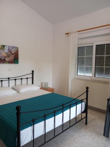 Ένα ή περισσότερα κρεβάτια σε δωμάτιο στο Apartment Margerita