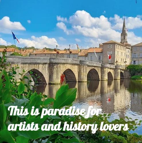 a bridge over a river withthis is paradise for artists and history lovers at Linden Lodge Stays in Saint-Claud