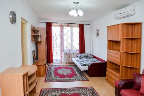 Postel nebo postele na pokoji v ubytování SovaApartman
