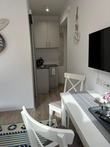 Η κουζίνα ή μικρή κουζίνα στο Apartamenty Via Mare