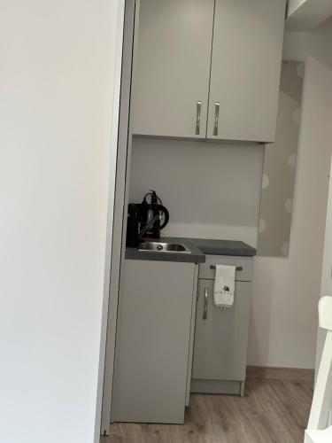 Η κουζίνα ή μικρή κουζίνα στο Apartamenty Via Mare