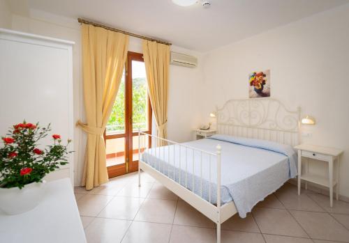 Postel nebo postele na pokoji v ubytování Hotel Anna