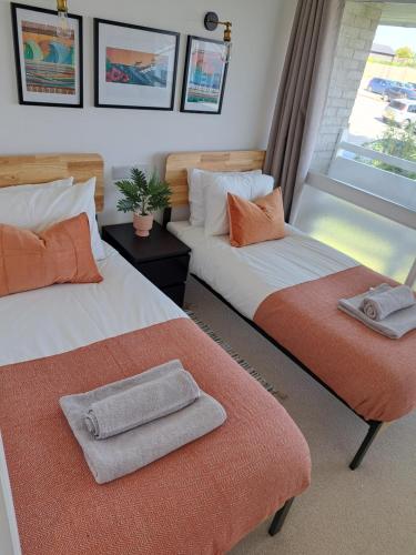 Postel nebo postele na pokoji v ubytování Vida Boa @ Atlantic Reach, Newquay