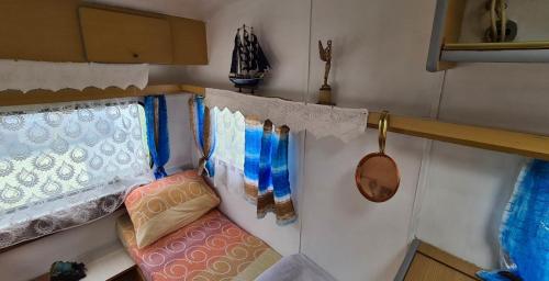 Cama ou camas em um quarto em Lakeside Camping