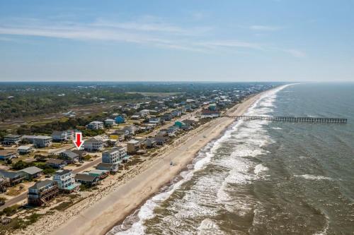 an aerial view of a beach with houses and the ocean at Anchor Haven Ocean Views in Oak Island