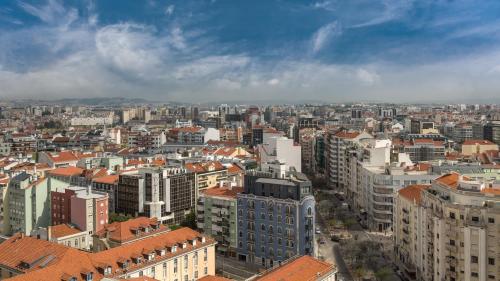 an aerial view of a city with tall buildings at Sheraton Lisboa Hotel & Spa in Lisbon