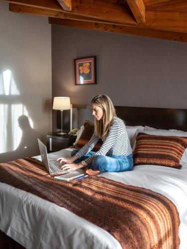 Katil atau katil-katil dalam bilik di Hotel Crans Montana