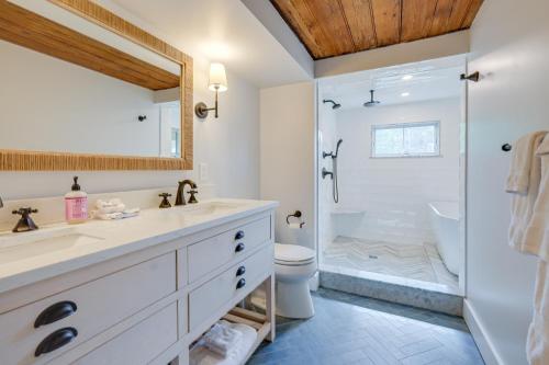 a bathroom with a sink and a shower and a toilet at Unique Scituate Vacation Rental on Herring River! in Scituate