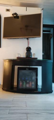 a television sitting on the floor in a living room at La Romantica in Contadora