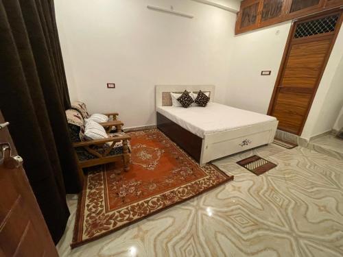 Cama o camas de una habitación en Govind Atithi Grah