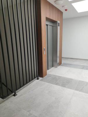 an empty room with a hallway with a door at Apartament Mińsk Mazowiecki in Mińsk Mazowiecki