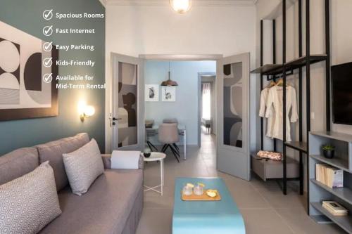 a living room with a couch and a table at apt.27-102 in Nafplio