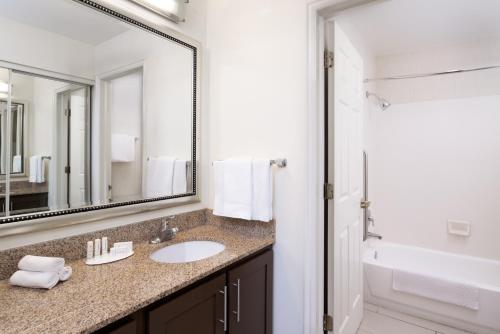 a bathroom with a sink and a mirror at Residence Inn by Marriott Provo in Provo