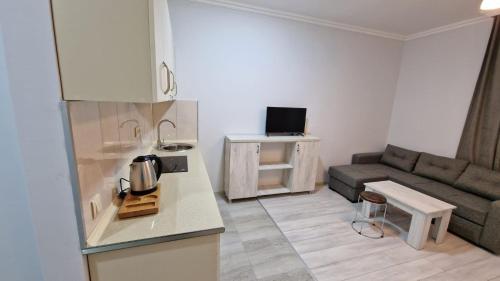Kuchyň nebo kuchyňský kout v ubytování Salami Residence