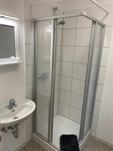 a bathroom with a shower and a sink at Ferienwohnung in Bad Segeberg in Bad Segeberg