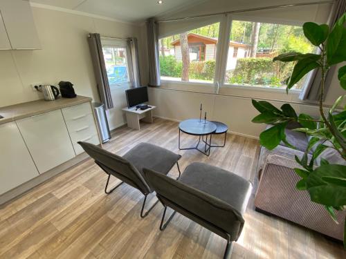 Dapur atau dapur kecil di Chalet in de Veluwse bossen