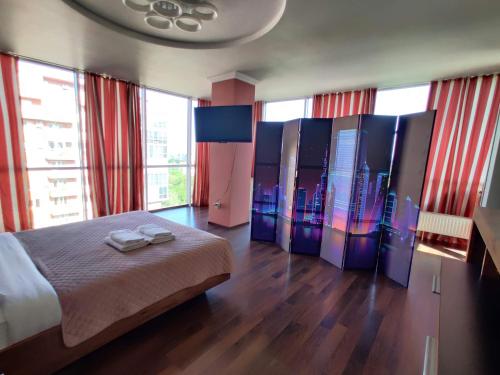 Кровать или кровати в номере Micromegas apartments