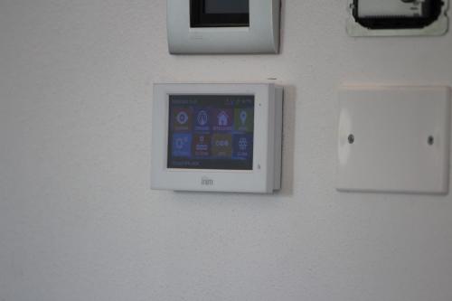 a wall with an iphone screen on a wall at Dimora Due Galli in Ponti Sul Mincio