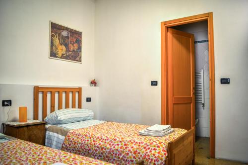 Letto o letti in una camera di Bed And Breakfast Arcobaleno