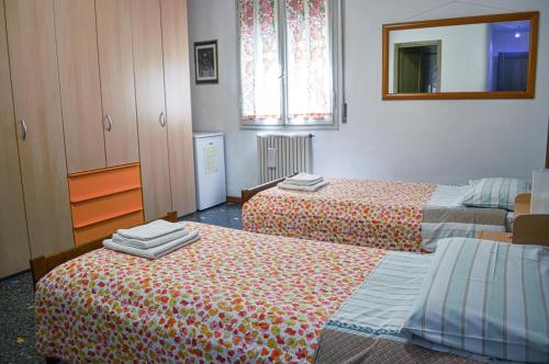 Letto o letti in una camera di Bed And Breakfast Arcobaleno
