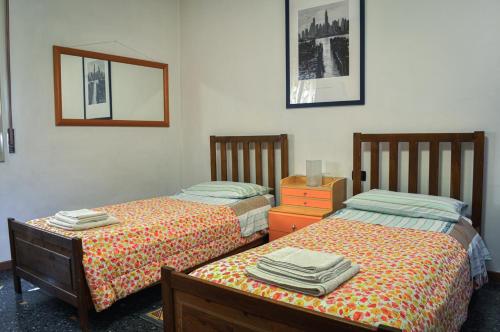 Letto o letti in una camera di Bed And Breakfast Arcobaleno