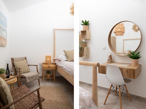 a bedroom with a bed and a mirror and a chair at Apartments and rooms Jakić in Medulin