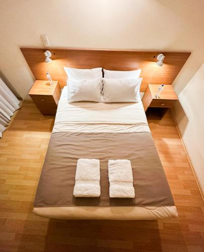 Hotel Piru Wasiにあるベッド