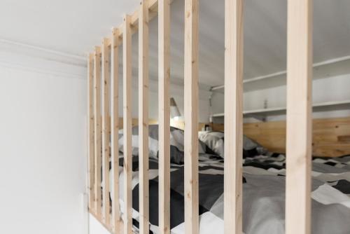 Postel nebo postele na pokoji v ubytování MontSéjour - Logement Climatisé Netflix, Mezzanine