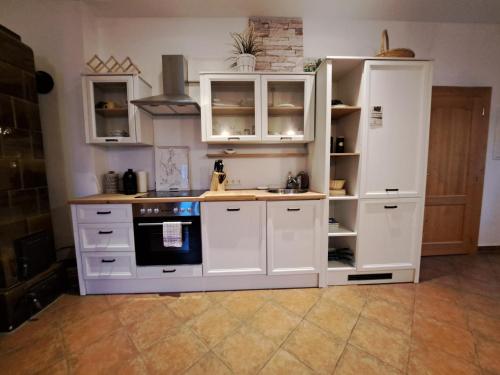 Una cocina o zona de cocina en Gasthaus zum Fuchs - Familie Andrä