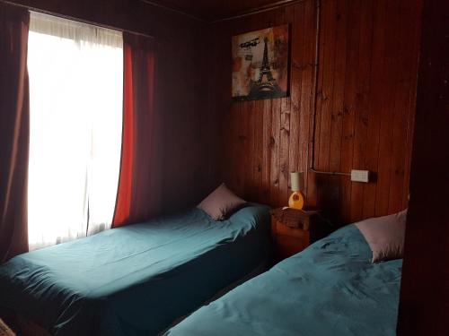 Postel nebo postele na pokoji v ubytování CABAÑA QUISQUEÑA