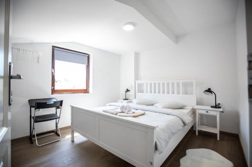 Posteľ alebo postele v izbe v ubytovaní Apartmani Jančić