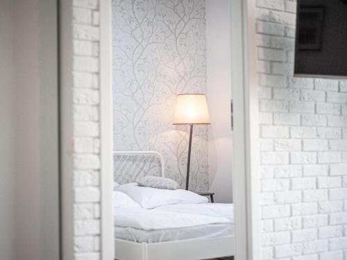 Katil atau katil-katil dalam bilik di Baltica Heaven by 2HomeRent