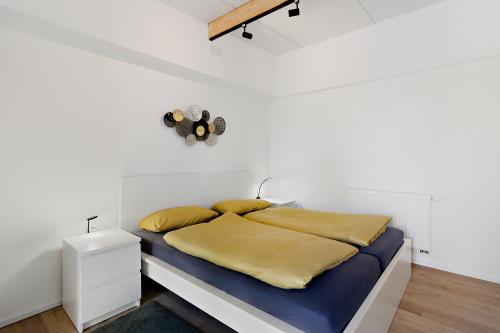 Katil atau katil-katil dalam bilik di Bungalow für 2 - Parkplatz - Küche - Terrasse