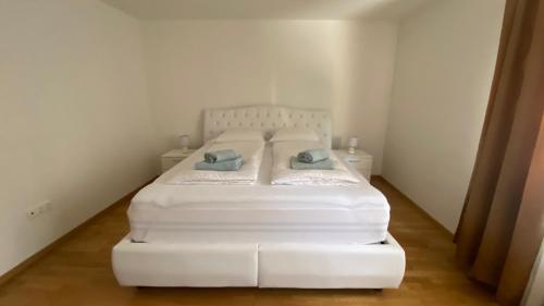 Ένα ή περισσότερα κρεβάτια σε δωμάτιο στο Stara Čaršija apartman