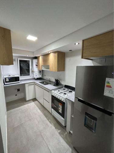 Dapur atau dapur kecil di Departamentos Agringof 1