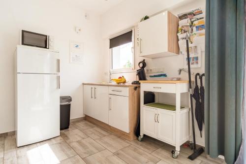 Η κουζίνα ή μικρή κουζίνα στο Eifel-Apartments Orsfeld