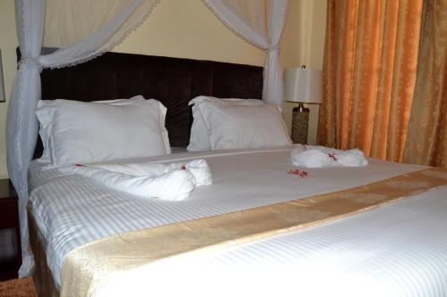 Cama o camas de una habitación en Lantana Hotel