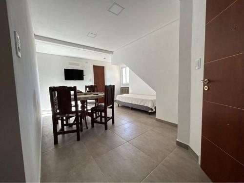Katil atau katil-katil dalam bilik di Departamentos Agringof 1