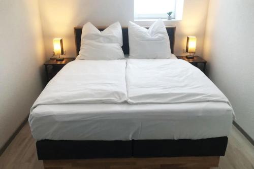 Posteľ alebo postele v izbe v ubytovaní Frisch saniertes Häuschen zum Wohlfühlen