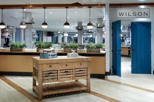 a shop with a blue door and a table in a store at Meliá Orlando Celebration in Orlando