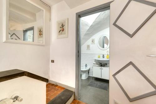a bathroom with a toilet and a sink at Florence Holiday Homes Ponte Vecchio in Florence