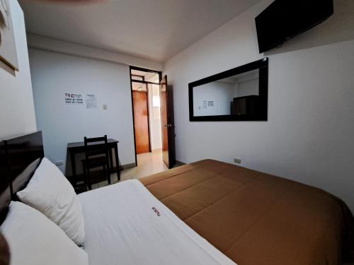 Ένα ή περισσότερα κρεβάτια σε δωμάτιο στο Tintaya Hotel Chachapoyas