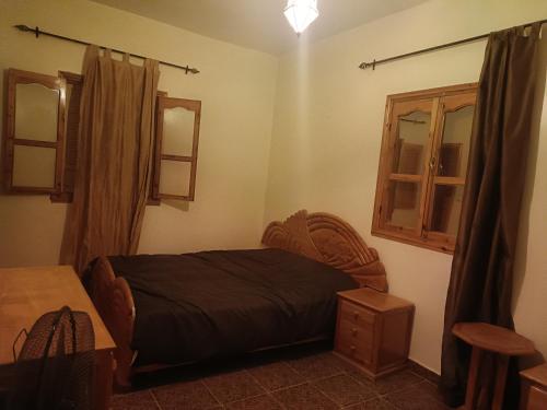 Ένα ή περισσότερα κρεβάτια σε δωμάτιο στο Dar badiawarda