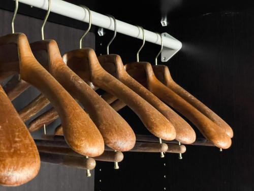 a bunch of hot dogs hanging on a rack at Regina di Laglio - Free Parking, Garden, Lake View in Laglio