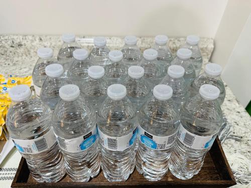 a bunch of water bottles sitting on a tray at Timberland Inn & Suites in Castle Rock