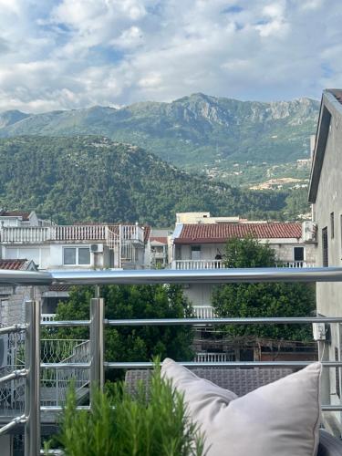a balcony with a view of the mountains at Apartments Villa Stefan in Budva